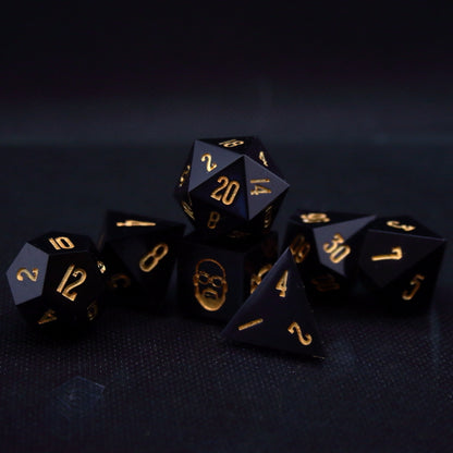 Black TTRPG dice set inked in gold, symbolizing Guy-man of Daft punk